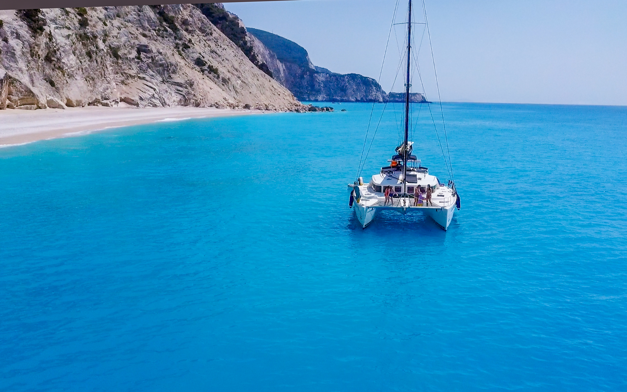 Catamaran boat trip in Crete during day or sunset